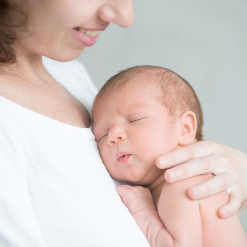 Mom holding newborn baby